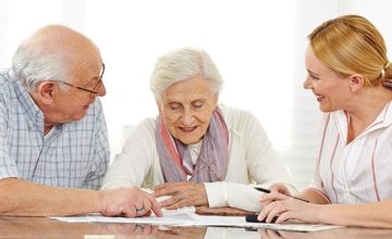 Elderly couple reviewing conservatorship and guardianships